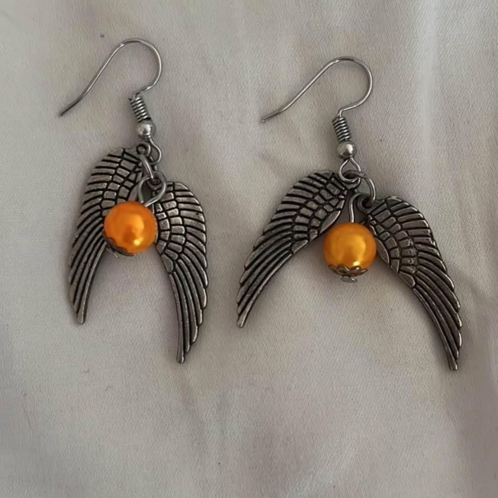 Cute quirky winged Snitch Quidditch Harry Potter earrings!